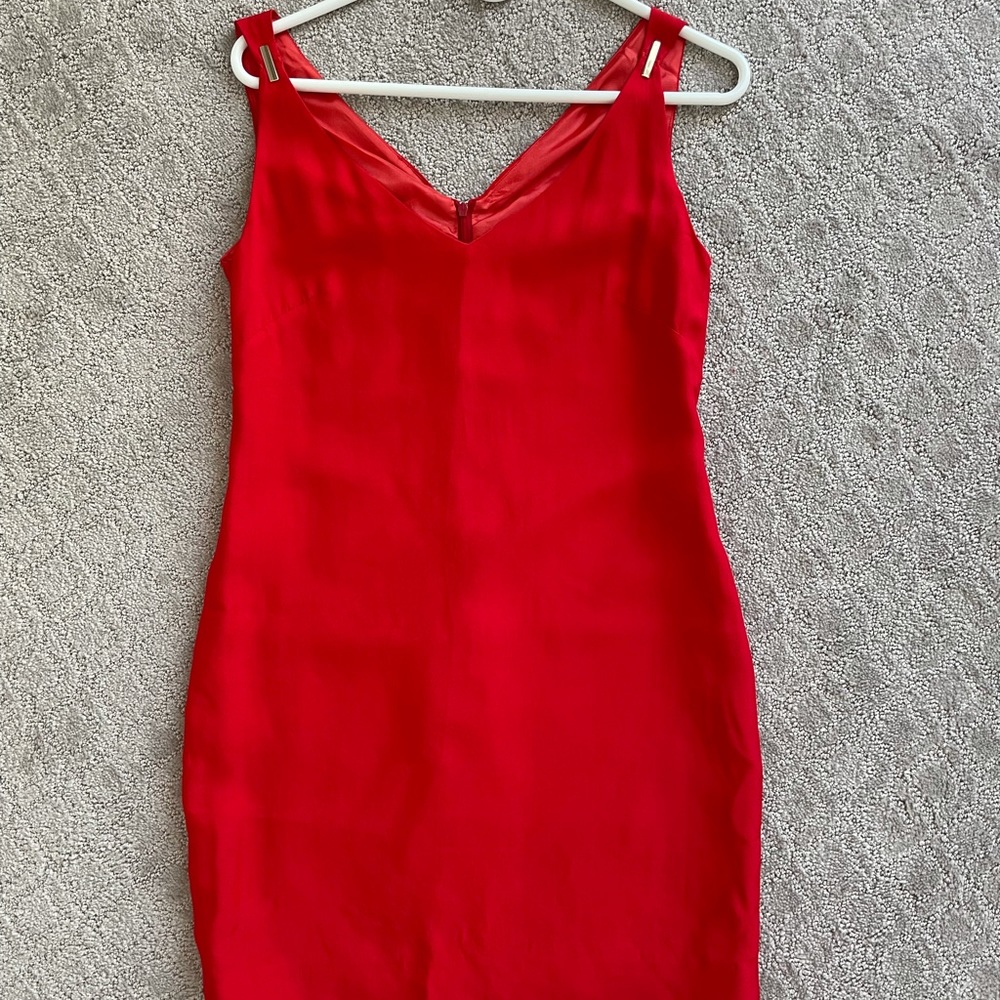 Lipstick red mini dress. Size 0-2. Hits mid-thigh.